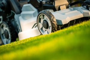 mowing a beautiful lawn 
